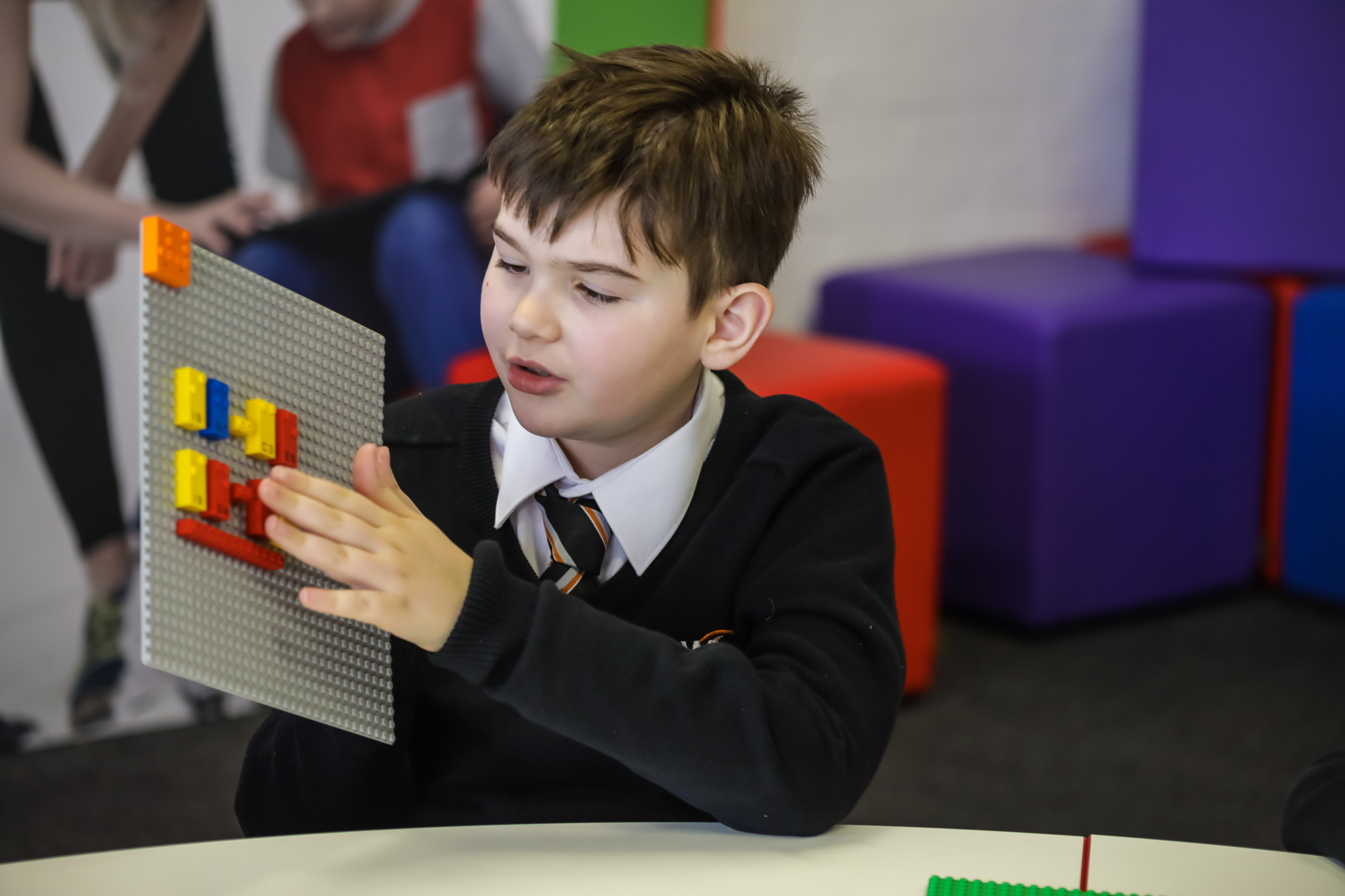 Image of child playing with LEGO toys